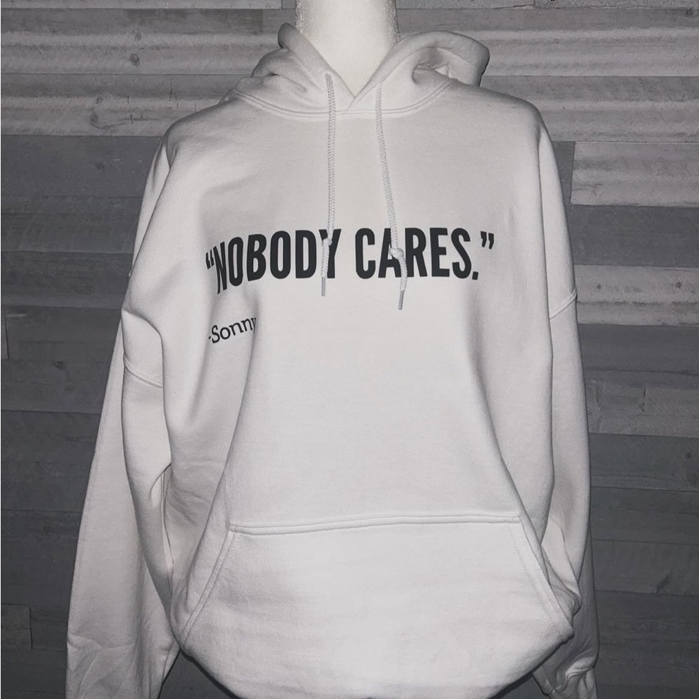 White Hoodie with "Nobody Cares" Print